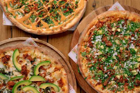 La Cantidad de Pizza Consumida el Domingo