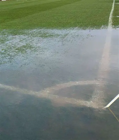 The Perils of Muddy Stadiums: Navigating the Challenges of Waterlogged Pitches