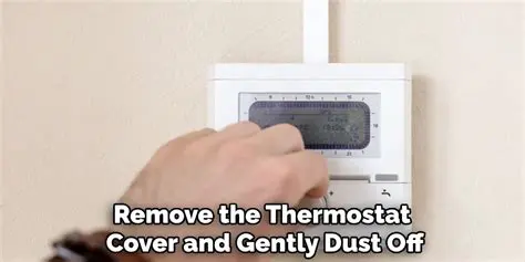Remove the thermostat cover